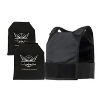 The concealed vest and its two Level IV plates on a white background